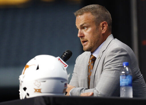 3, The Texas coach fired one coordinator and demoted another.